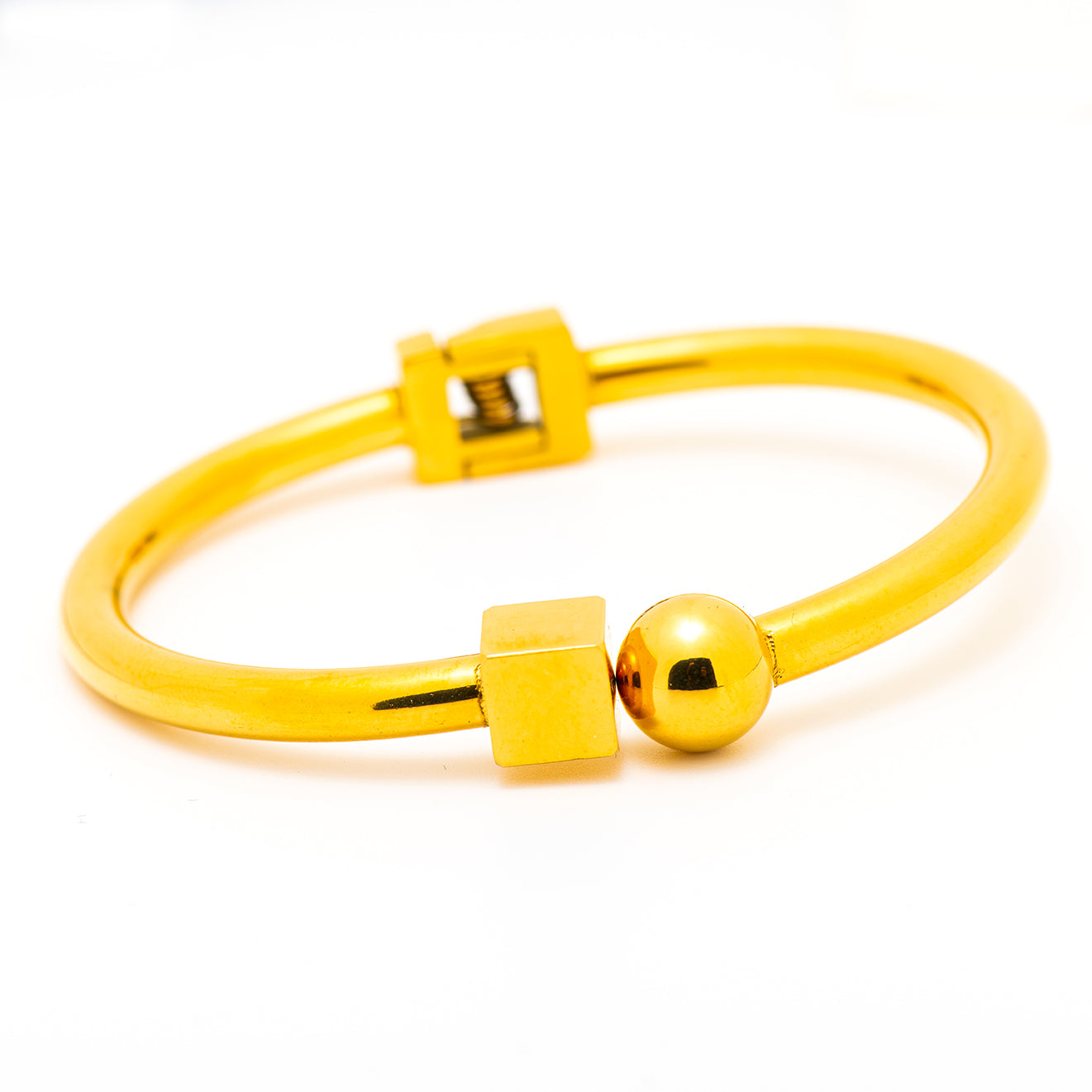 stainless steel bangle with a square and circle shapes