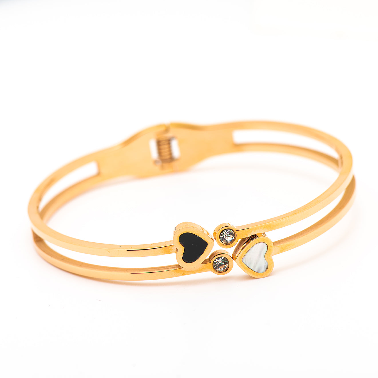 stainless steel bangle with 2 hearts.
