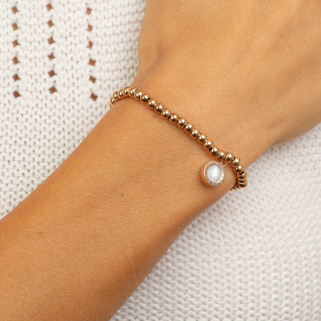 Stainless steel elastic bead bracelet with black and white MOP