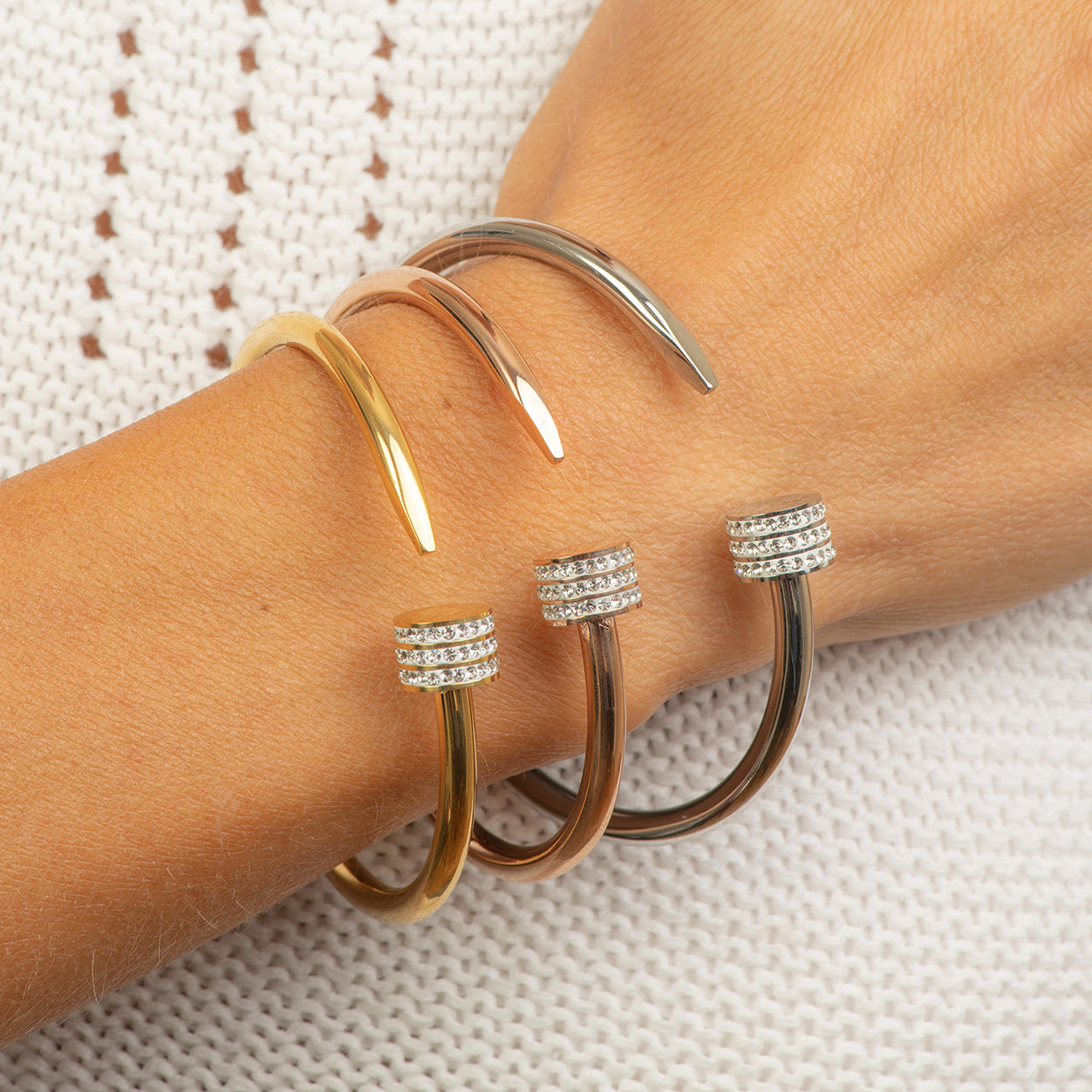 Stainless steel bangle half a nail with crystals