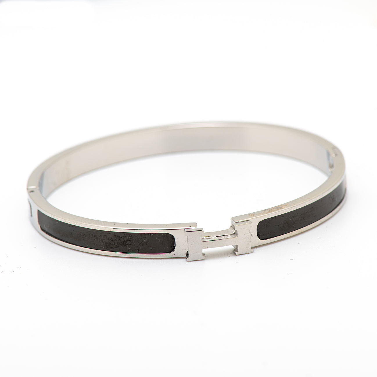 Stainless steel H bangle.