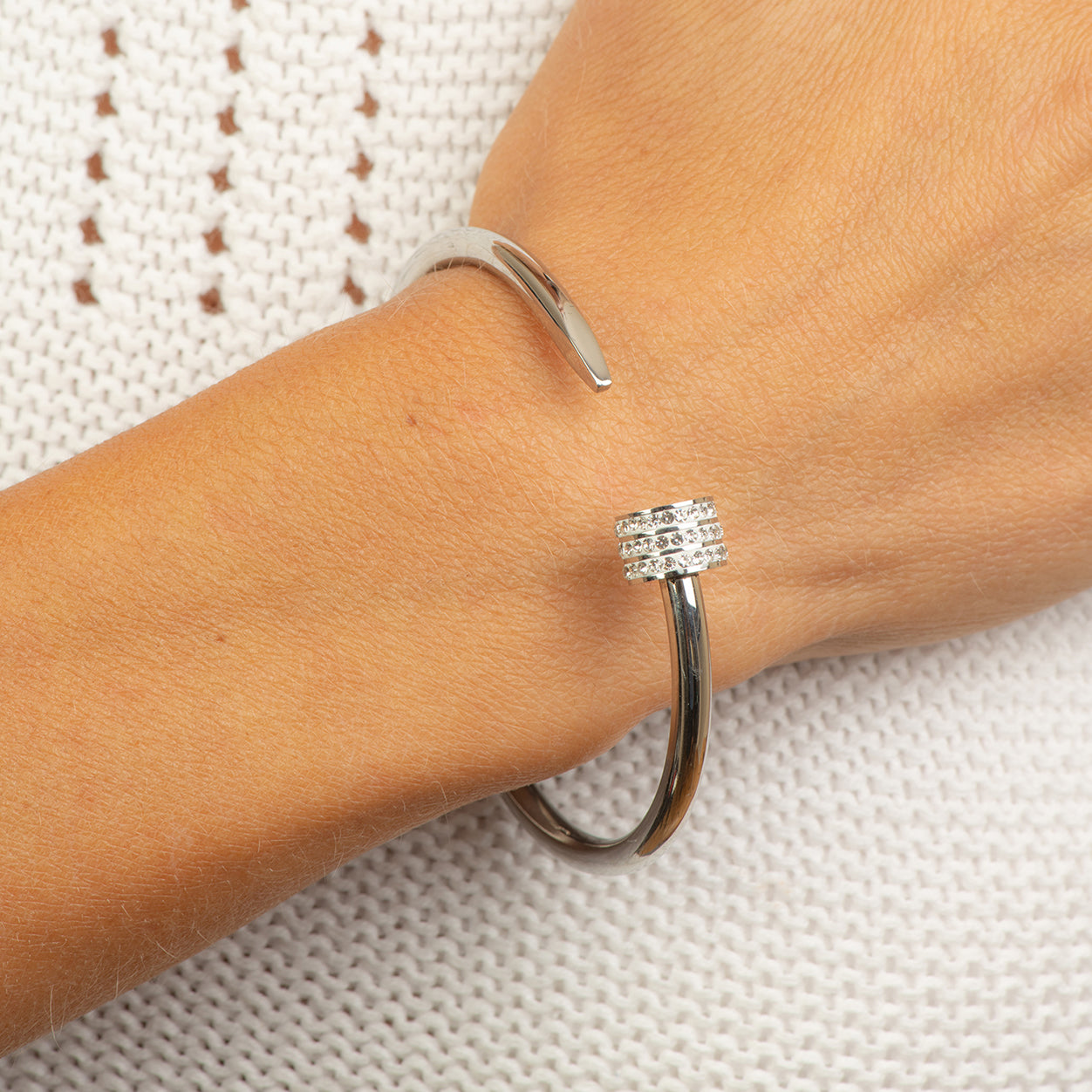 Stainless steel bangle half a nail with crystals